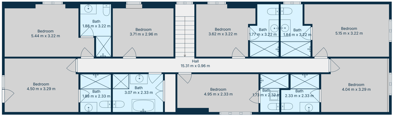 Floor plan of a multi-story residential building with rooms labeled and dimensions.